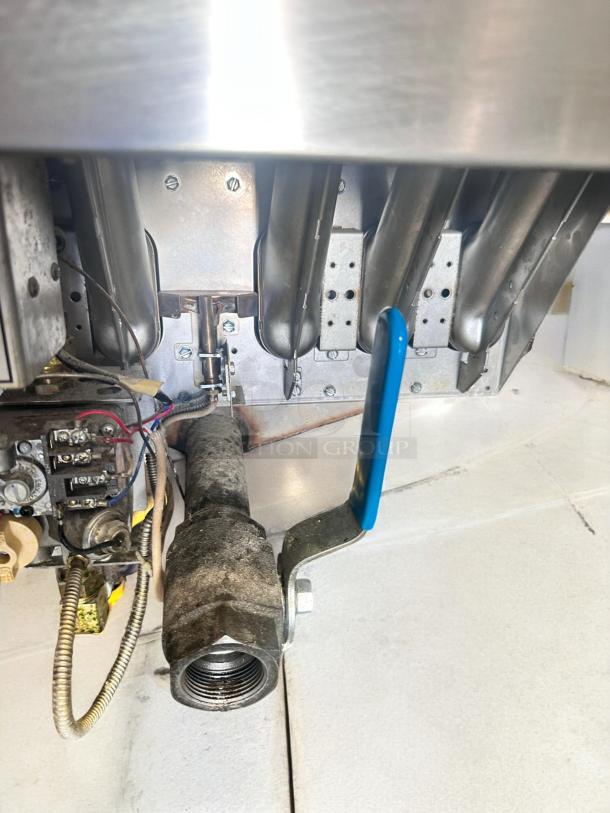 Pitco SG18S gas fryer in excellent condition, 65 lb capacity, natural gas, fully tested, internal components visible.