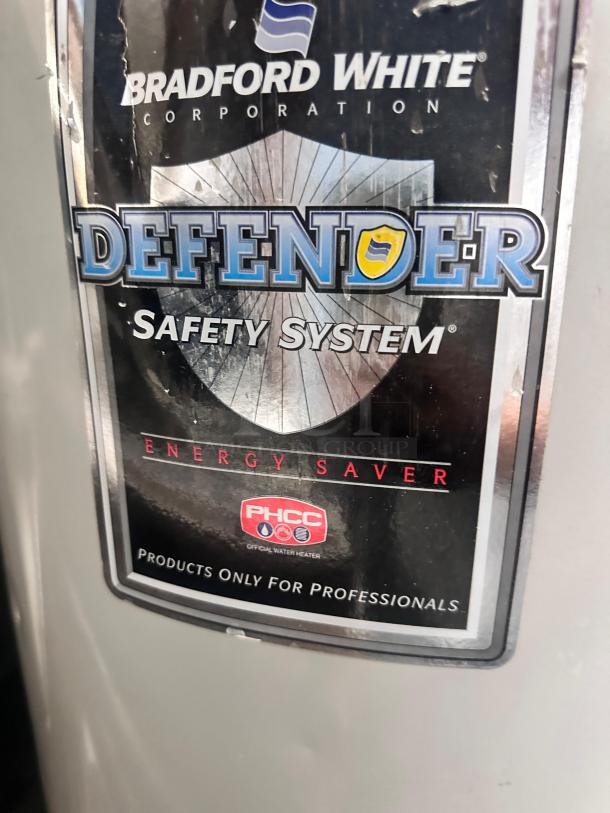 Bradford White Defender Safety System gas water heater, model M45036FBN, excellent condition, energy saver label visible.