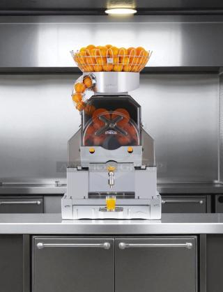 Citrocasa 8000SB Commercial Orange Juicer, excellent condition, fully tested, operational, automatic with visible juice cup.
