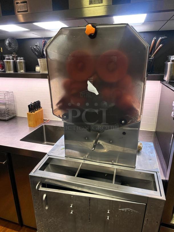 Citrocasa 8000SB commercial orange juicer in excellent condition, fully tested, model 90.002/ATS-115, stainless steel.