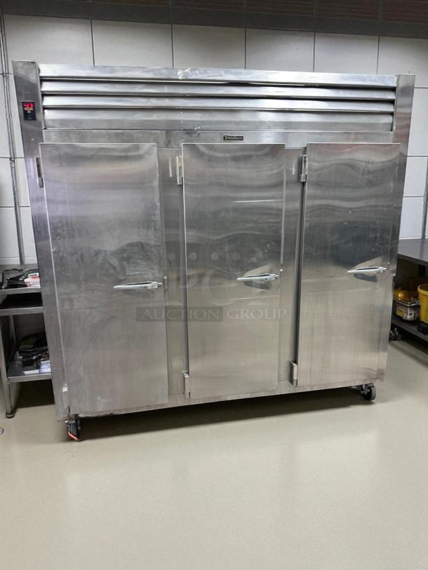 Traulsen 3-Door Commercial Freezer, Model RLT332WUT-FHS, excellent condition, fully tested, stainless steel finish.
