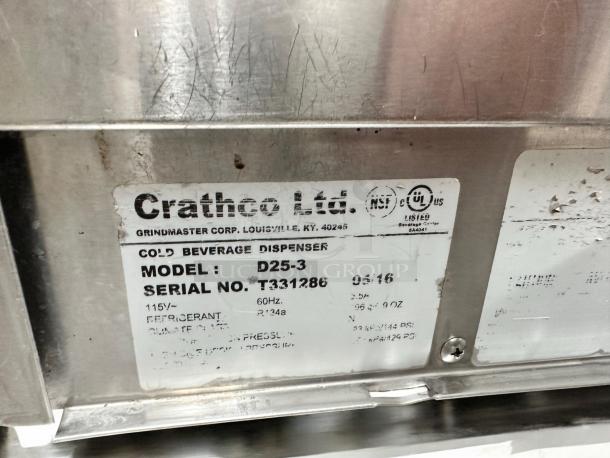 Alt text: Crathco D25-3 cold beverage dispenser label, serial T331286, in excellent condition. Fully tested and operational.