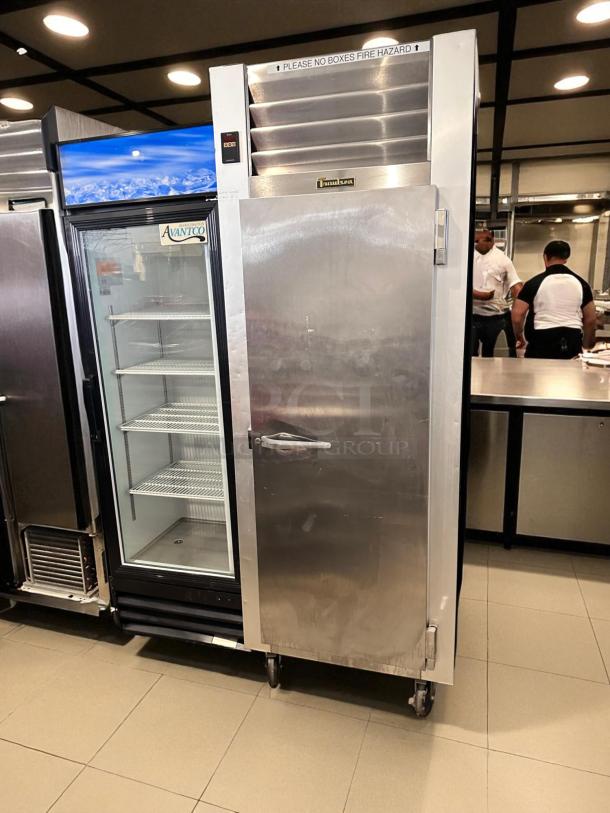 Traulsen G10010 commercial refrigerator in excellent condition, 115V, fully tested and working, with "Traulsen" logo.
