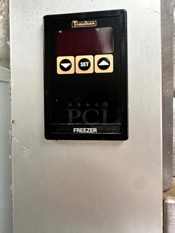 Traulsen G12010 commercial freezer control panel, excellent condition, fully tested, black interface with buttons.