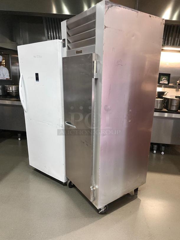 Traulsen G12010 commercial freezer, excellent condition, stainless steel, fully tested, working, with caster wheels.