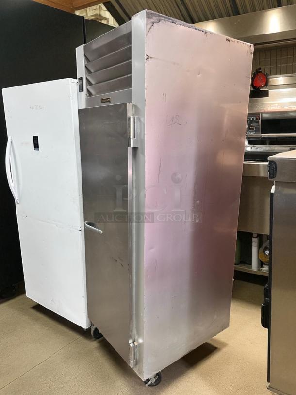 Traulsen Commercial Freezer Model G12010, in excellent condition, fully tested and working, stainless steel, on casters.