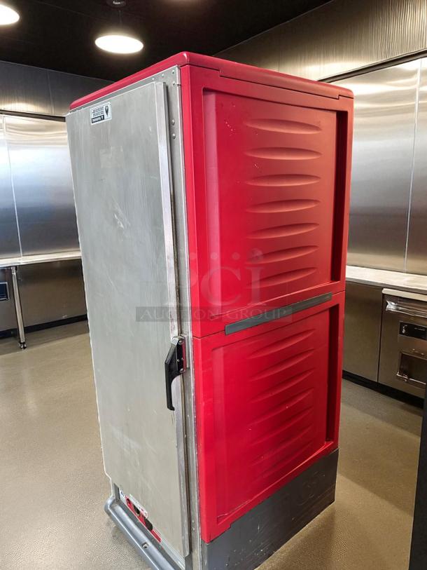 Metro Heated Holding Cabinet Model C539-HFS-U, excellent condition, fully tested, stainless steel with red exterior.
