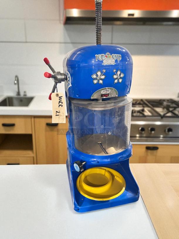 Great Northern Polar Pal Ice Shaving Machine, excellent condition, tested and working, blue with snowflake design, model tag visible.