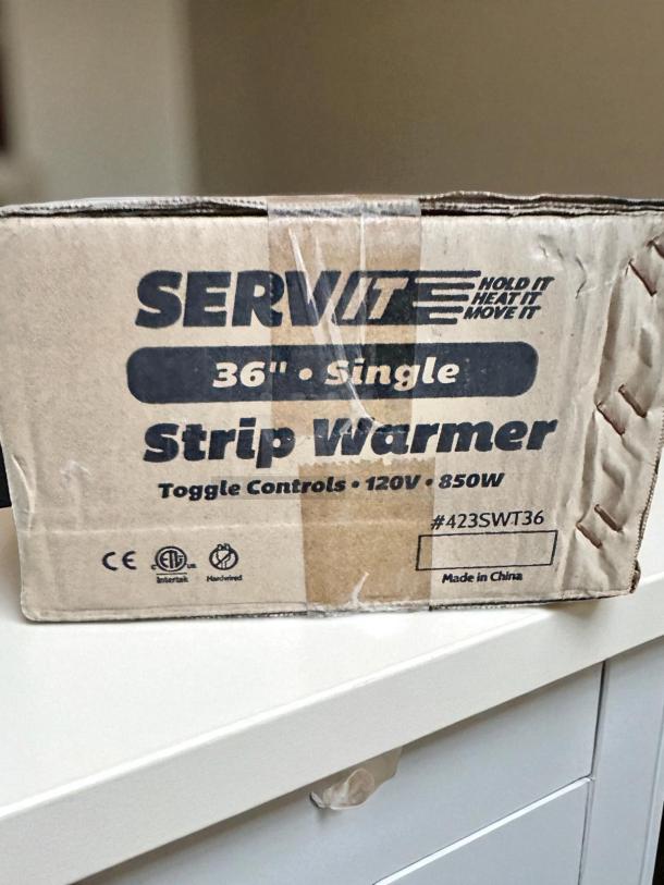 ServIt SWT36 36" Single Strip Warmer in excellent condition. Box shows CE and Intertek markings, 120V, 850W, made in China.
