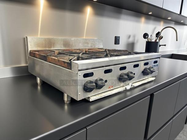 Vulcan VHP636 natural gas countertop range with 6 burners, 36" wide, 180,000 BTU, in great condition, fully tested.