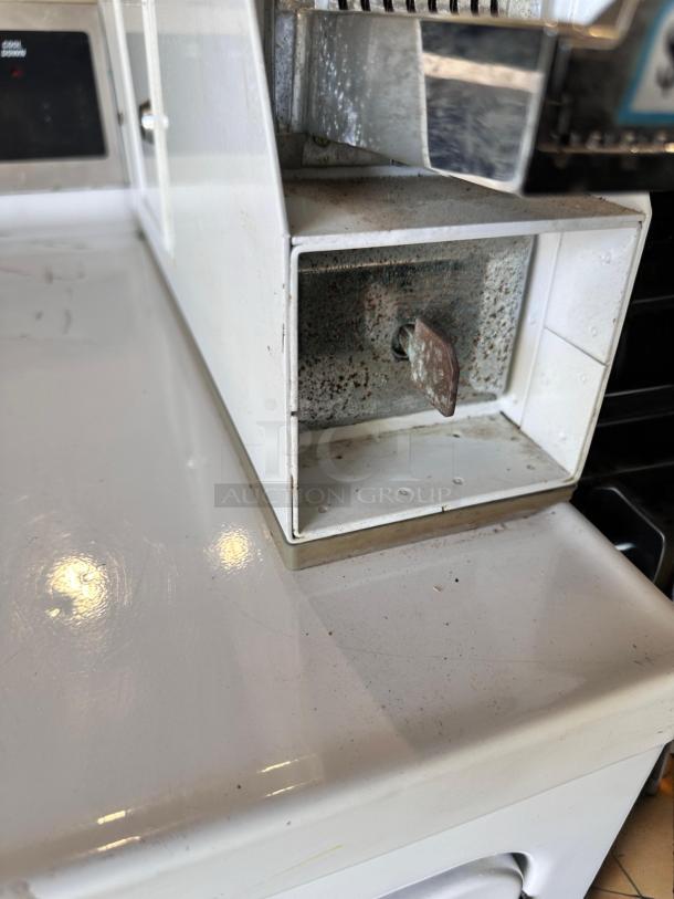 GE DCCD330ED2WC commercial electric dryer in excellent condition, 240V, fully tested, visible metal components and slight wear.