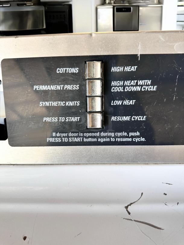 GE DCCD330ED2WC Commercial Electric Dryer panel; shows cycle options like Cottons, Permanent Press, tested, excellent condition.