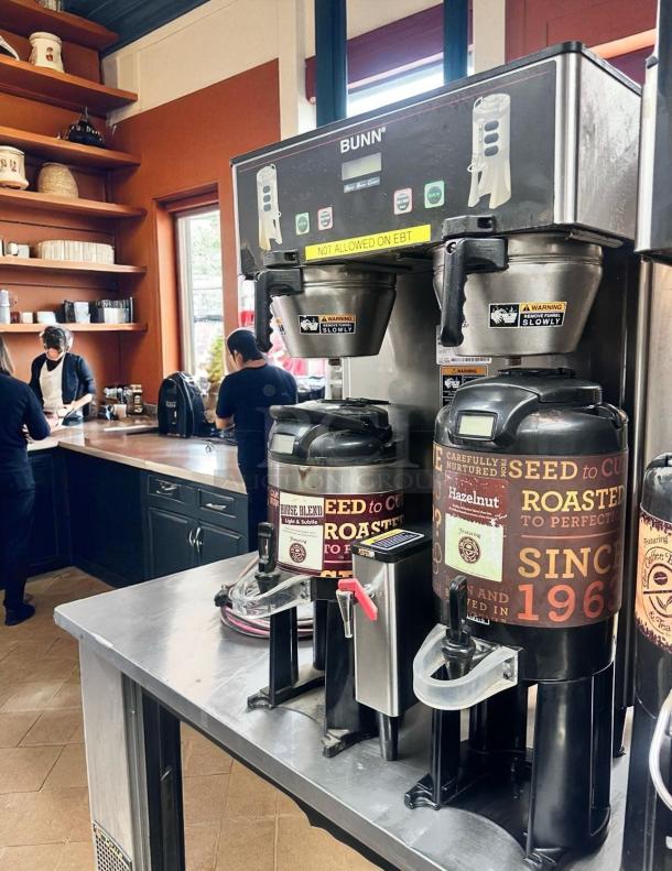 Bunn Dual Coffee Brewer with Airpots in excellent condition, fully operational, features digital controls and dual brewing stations.