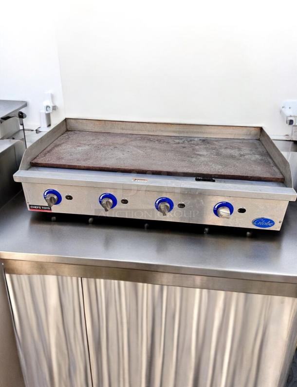 Globe 48" Commercial Gas Griddle, excellent condition, fully operational, stainless steel, blue control knobs, tested.