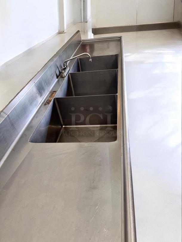 3-compartment stainless steel sink with dual drainboards in excellent condition, fully tested, commercial model.