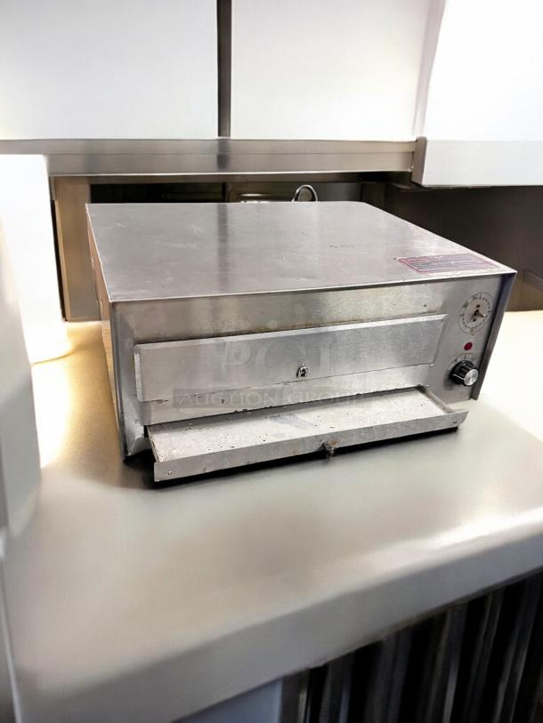 Commercial countertop electric pizza/bakery oven, excellent condition, unbranded, fully tested, stainless steel exterior.