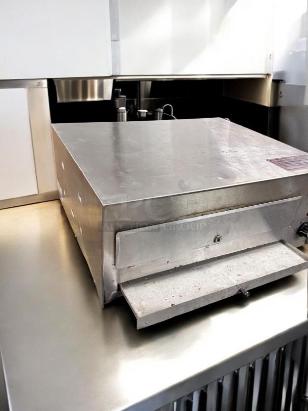 Commercial countertop electric pizza/bakery oven, unbranded, stainless steel, excellent condition, fully tested, operational.