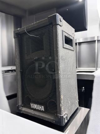 Yamaha professional PA speaker in excellent condition, fully tested, with grid cover and visible Yamaha branding.