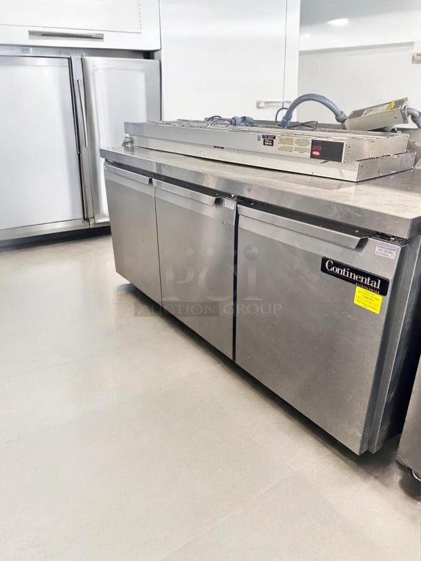 Continental 3-door undercounter refrigerator in excellent condition, fully tested and operational, stainless steel, visible branding.