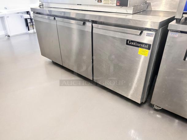 Continental 3-Door Undercounter Refrigerator, excellent condition, stainless steel, fully tested and operational, model label visible.