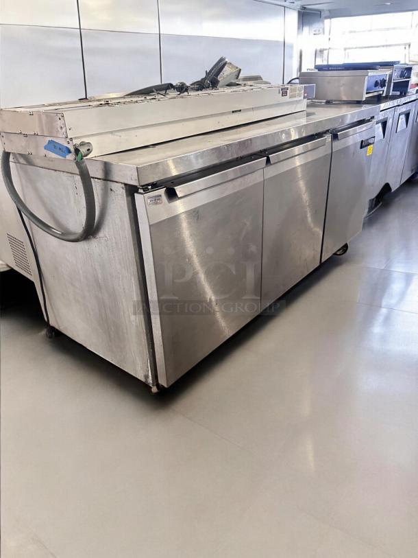 Continental 3-Door Undercounter Refrigerator, excellent condition, fully tested, stainless steel finish.