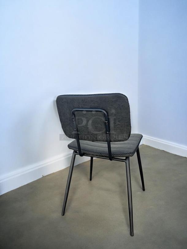 Black metal frame dining chair with upholstered seat and back. Excellent condition. Model: Dining Side Chair. Set of 4.