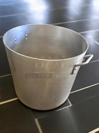 Heavy-duty aluminum stock pot, 80 qt, excellent condition, commercial use, side handles, ideal for large-scale cooking.
