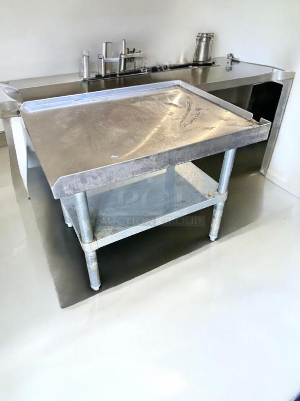GSW Stainless Steel Work Table, Model ES-S3024, 30" x 24", excellent condition, with undershelf, ideal for kitchens.