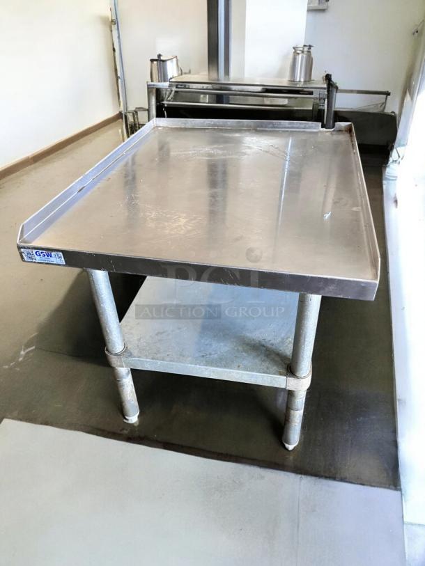 GSW stainless steel work table, model ES-S3024, 30" x 24", excellent condition, with undershelf and visible branding.