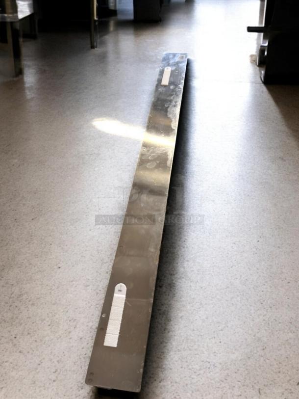 CIS CIS-36 stainless steel check holder, 36", excellent condition, tested and working, visible label indicating arrow direction.