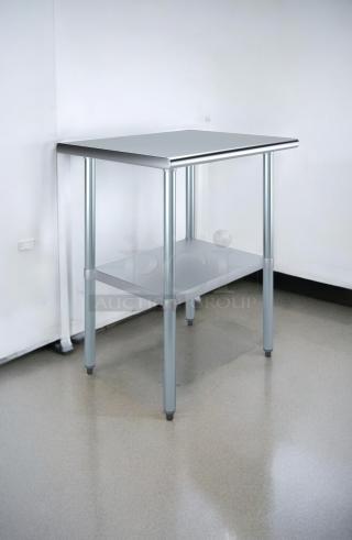 Commercial stainless steel work table, 24"W x 30"D x 34"H, excellent condition, features undershelf, fully tested.