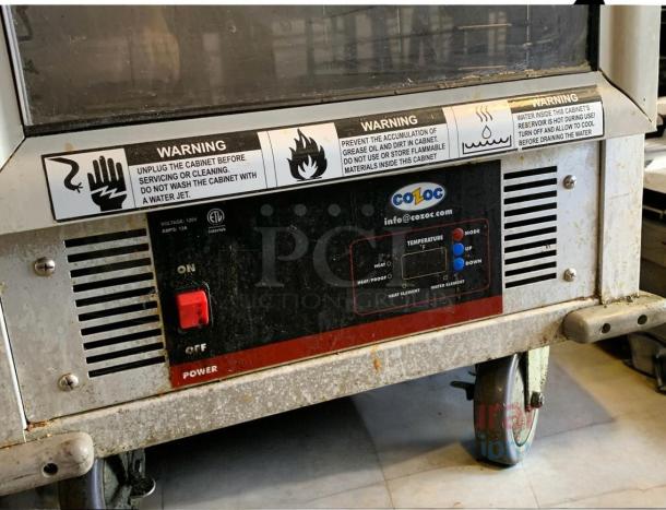 Cozoc Heated Holding Cabinet, Model HPC7008, excellent condition, fully tested, operational. Visible warnings and control panel.