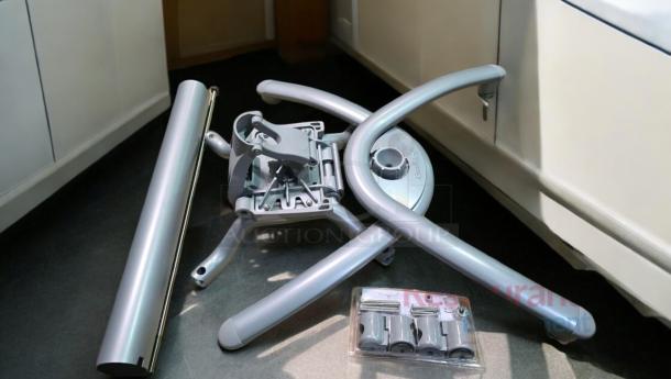 Brand new commercial folding table legs with collapsible base, silver finish, includes hardware, set of 7.