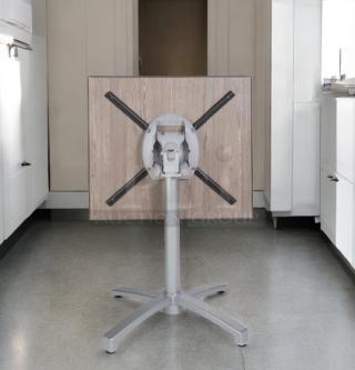 Brand new commercial folding table with collapsible base, unbranded, never used. Lot of 7. Wood top, metal legs.