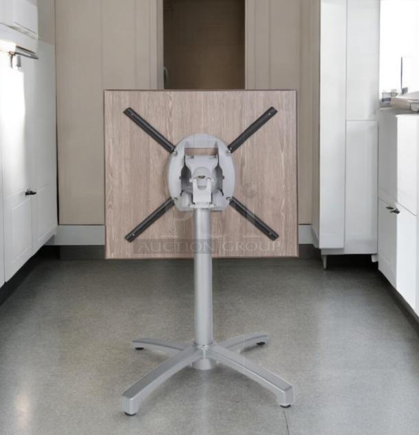 Brand new commercial folding table, unbranded, with collapsible base. Lot of 7, never used, in excellent condition.