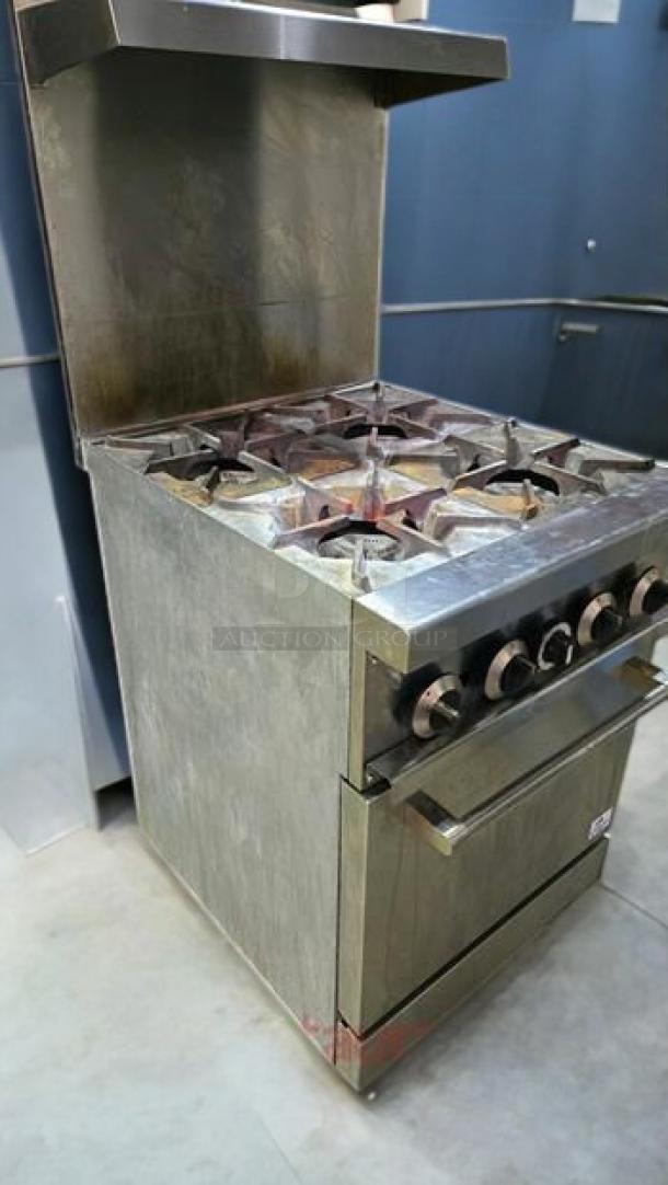 Commercial 4-burner gas range with oven, excellent condition, fully tested, stainless steel finish.