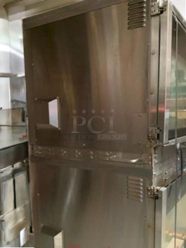 Hardt Inferno 4500 Gas Rotisserie Oven, excellent condition, 40 chicken capacity. Sturdy stainless steel construction, fully tested.