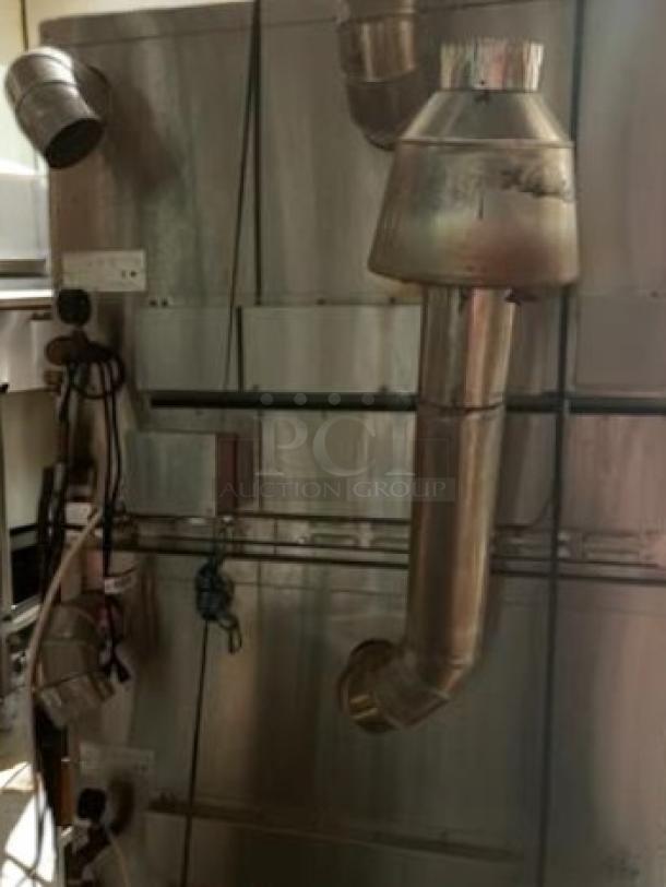 Hardt Inferno 4500 gas rotisserie oven, excellent condition, 40 chicken capacity, fully tested and working, metal exterior.