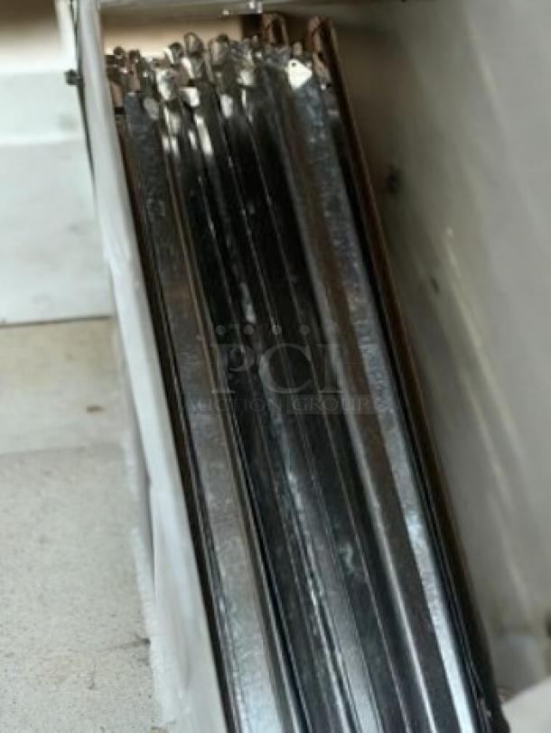 Hardt Inferno 4500 Gas Rotisserie Oven in excellent condition, showing metal skewers and interior components. Fully tested.