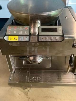 Commercial-grade automatic pita/flatbread maker. Excellent condition, fully tested, electric, with control panel and display.