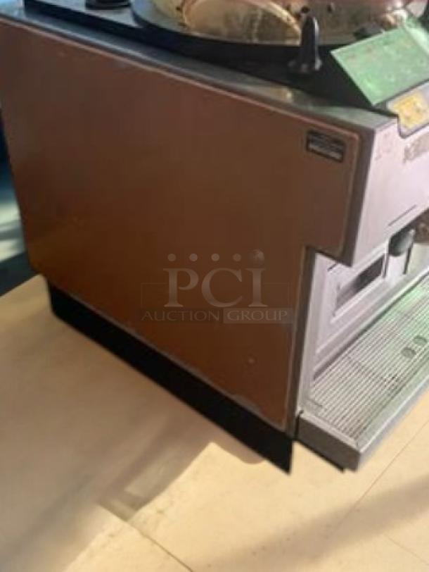 Commercial-grade automatic pita/flatbread maker in excellent condition, fully tested, electric, model visible, sturdy build.