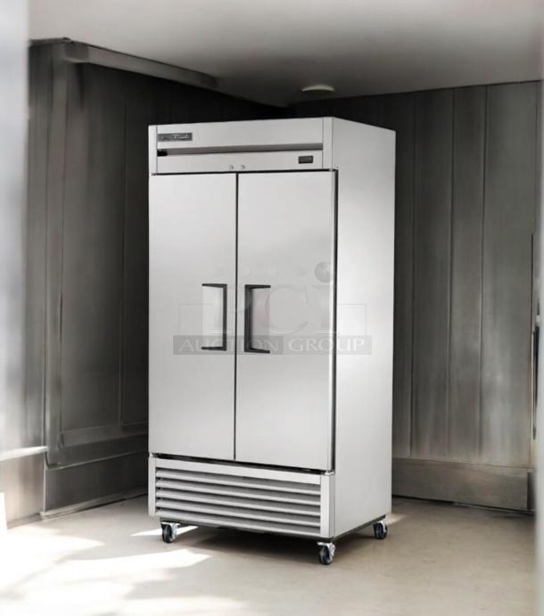 True T-35F-HC two-door reach-in freezer in excellent condition, 115V, fully tested, on casters for mobility.