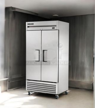 True T-35F-HC two-door reach-in freezer in excellent condition, 115V, fully tested, on casters for mobility.
