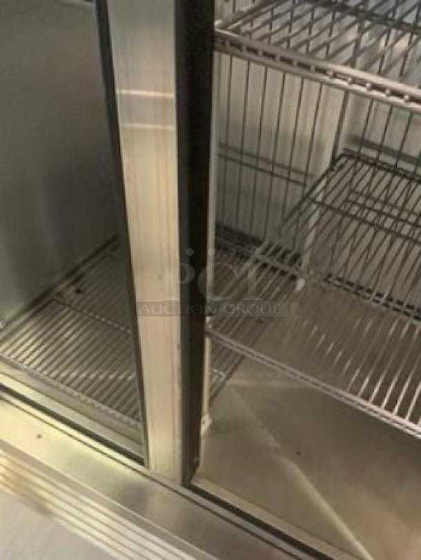 True T-35F-HC two-door reach-in freezer, excellent condition, stainless steel interior, adjustable wire shelves, 115V.