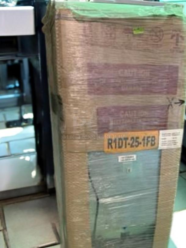 Brand new Randell R1DT-25-1FB reach-in refrigerator/freezer, dual section, wrapped and factory sealed with visible model label.