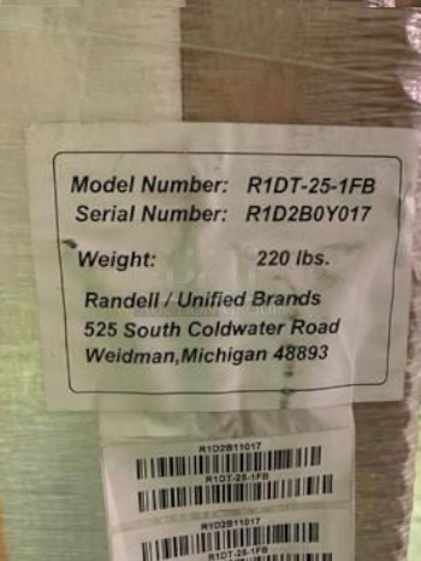 Randell R1DT-25-1FB Reach-In Refrigerator/Freezer, new, factory-sealed. Label with model, serial, weight, address visible.