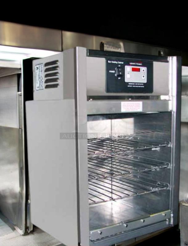 Henny Penny BW-100 Bun Warmer in excellent condition, stainless steel, 120V, with digital controls, open door showing shelves.