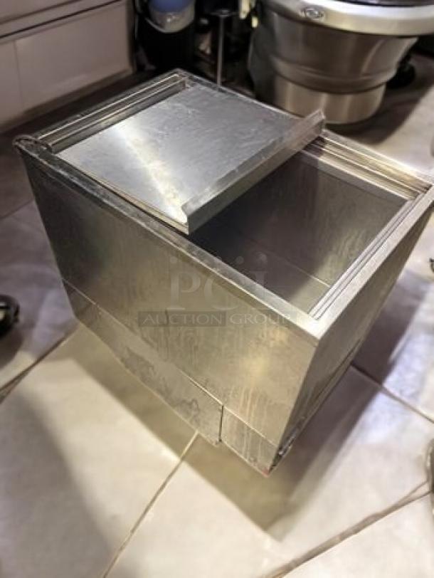 HSK International refrigerated undercounter freezer in excellent condition. Features digital controls, stainless steel finish, 115V.