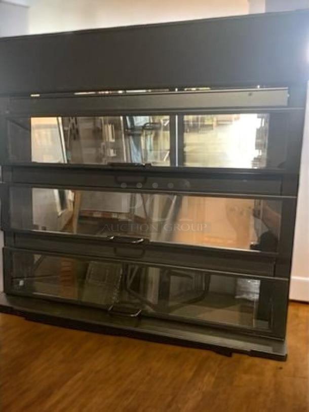 Nemco Hot Food Merchandiser, 4-tier glass display, excellent condition, fully tested, commercial warmer.
