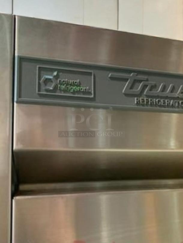 True T-23-2-HC two-door reach-in refrigerator, stainless steel, excellent condition, 23 cu. ft., 115V, branded panel visible.